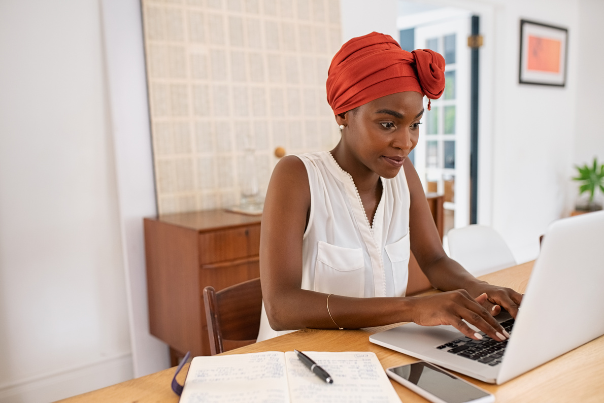 Mature African American Woman Working on Laptop from Home